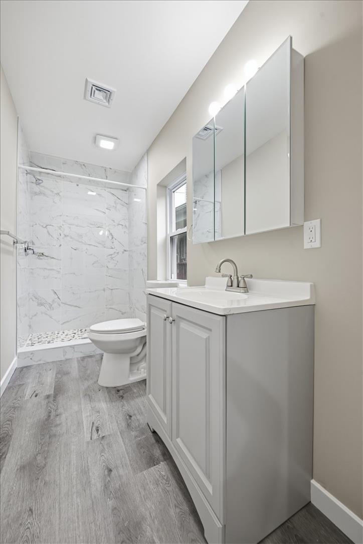 5641 North Coplay Road Whitehall, PA 18052 - Photo 33 of 68 Modern bath with walk-in shower and ample vanity storage.