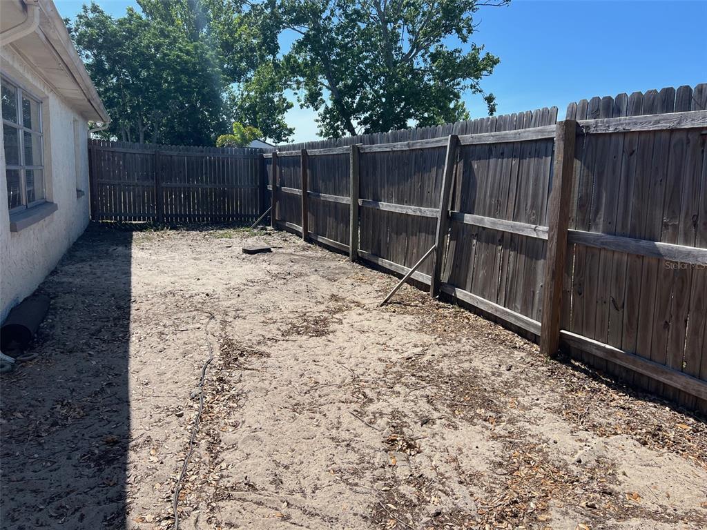 7835 Arbordale Drive Port Richey, FL 34668 - Photo 5 of 21 a view of wooden fence