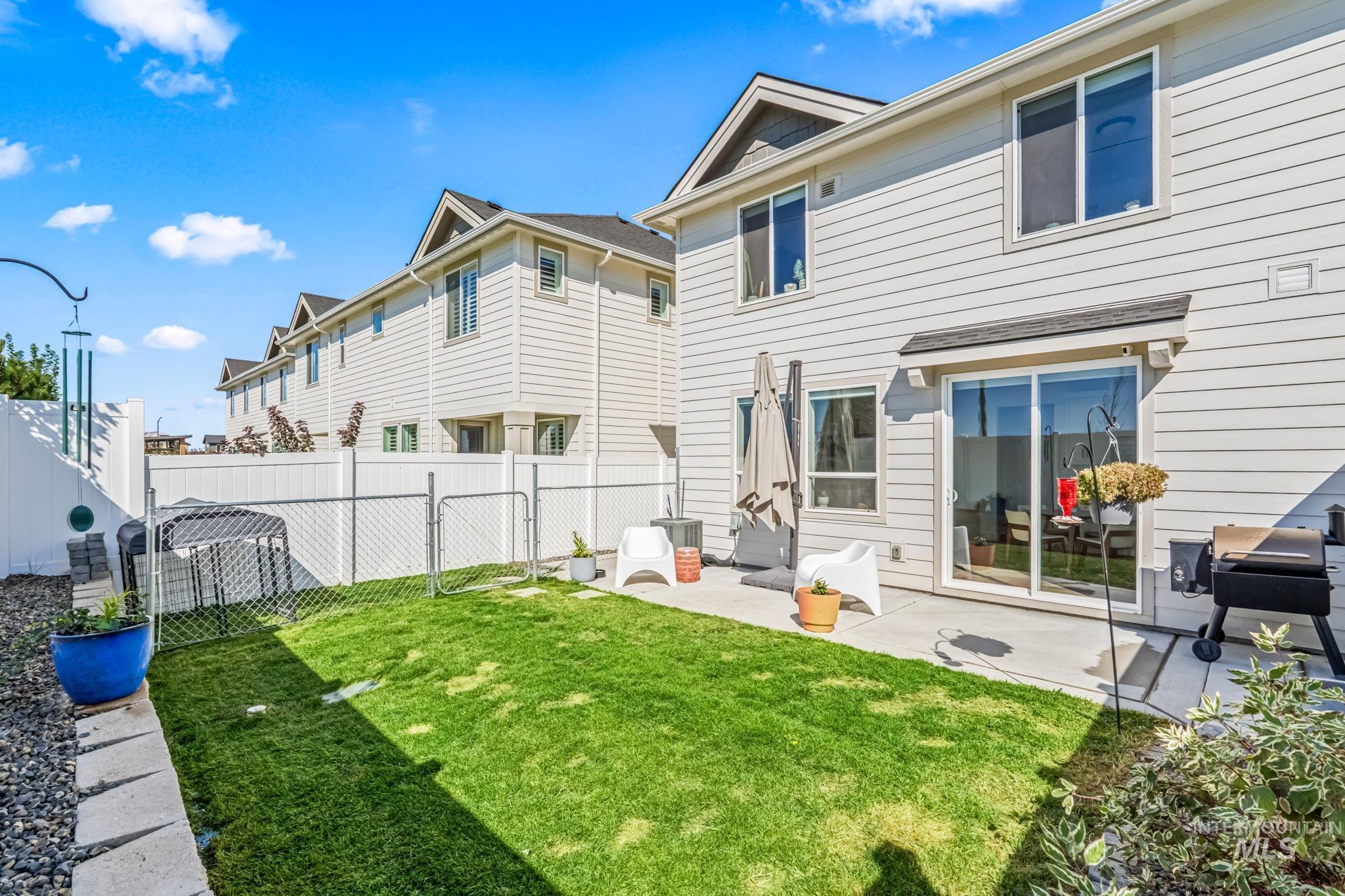 4637 West Riva Capri Street Meridian, ID 83646 - Photo 37 of 48 Back of property with a patio