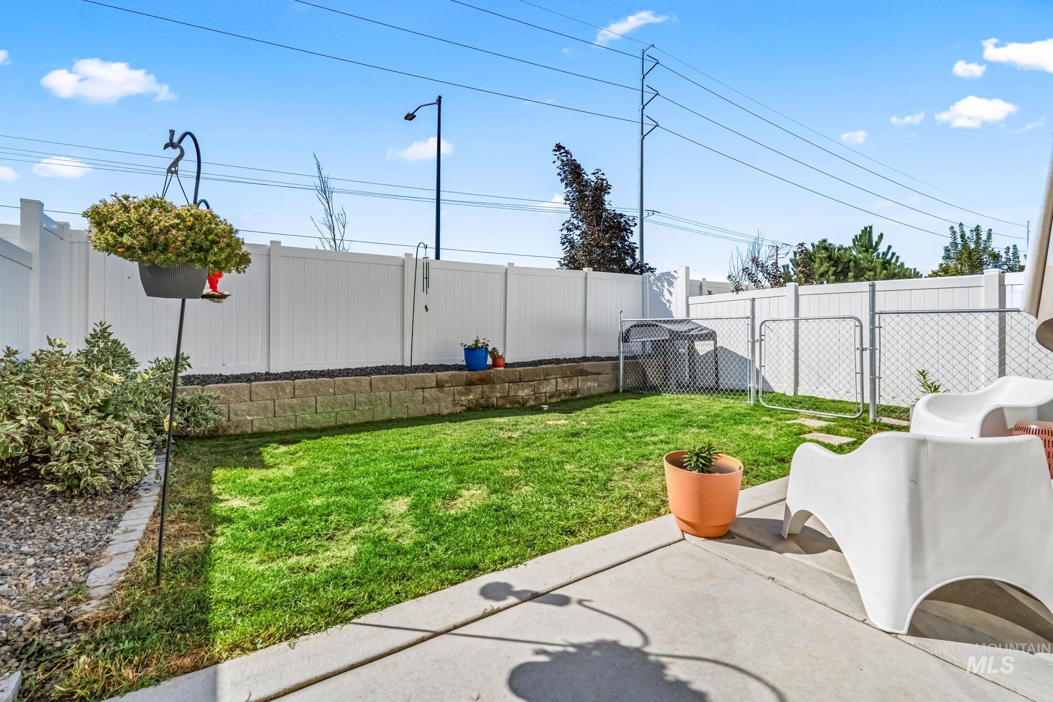 4637 West Riva Capri Street Meridian, ID 83646 - Photo 42 of 48 Fenced backyard featuring a patio area