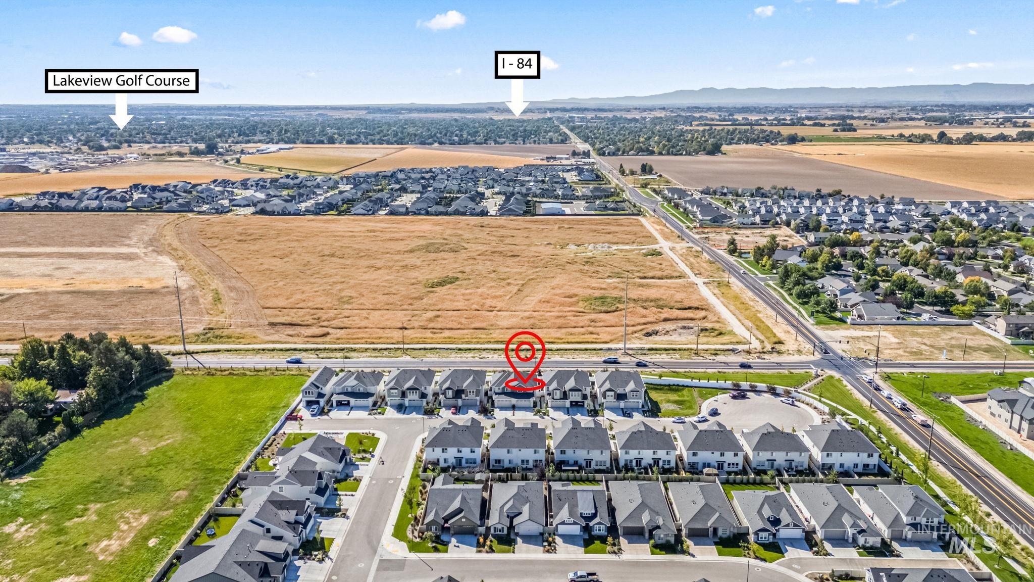 4637 West Riva Capri Street Meridian, ID 83646 - Photo 45 of 48 Aerial perspective of suburban area with a mountain backdrop