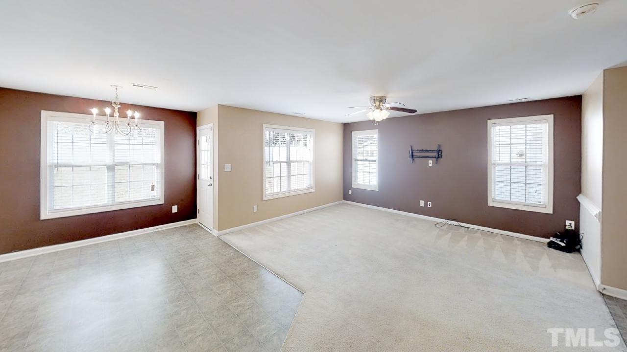 3636 Rendition Street Raleigh, NC 27610 - Photo 3 of 25 an empty room with windows