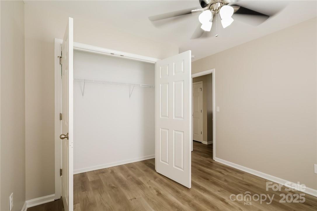 733 Jones Branch Road Fort Mill, SC 29715 - Photo 11 of 15 a view of an empty room with wooden floor
