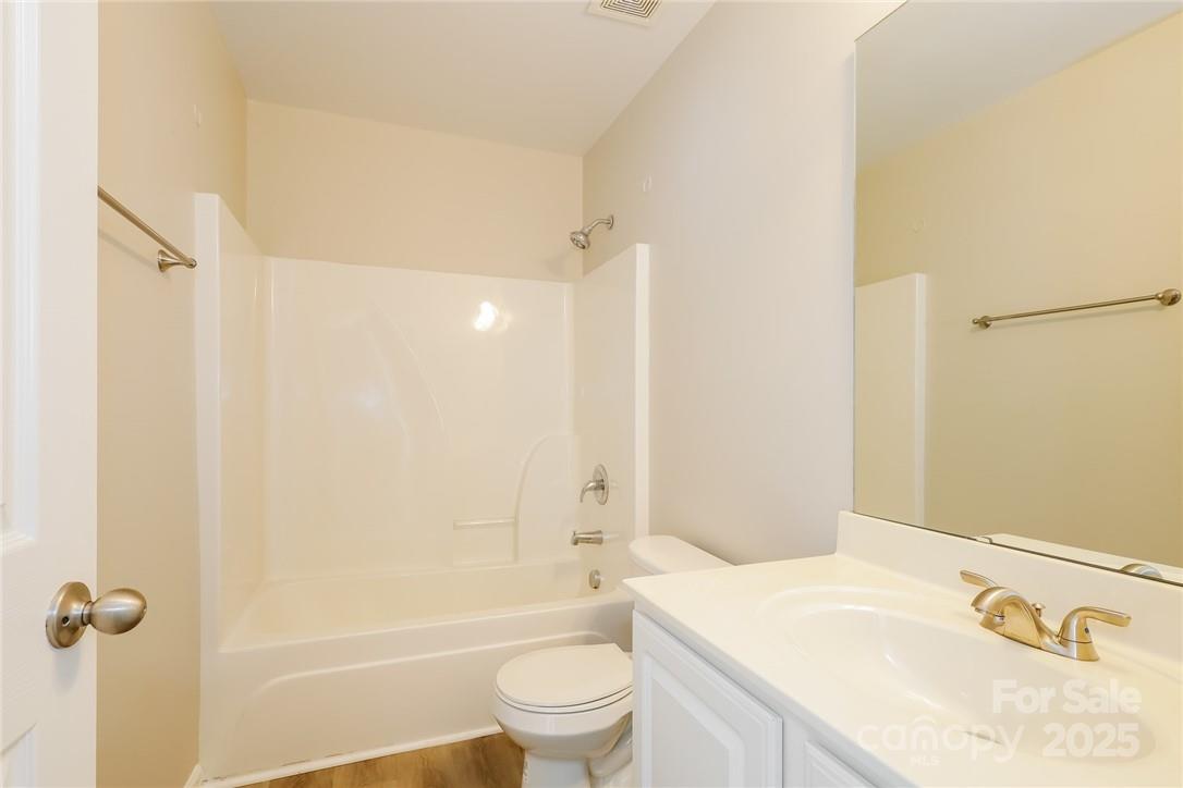 733 Jones Branch Road Fort Mill, SC 29715 - Photo 12 of 15 a bathroom with a sink a toilet and shower