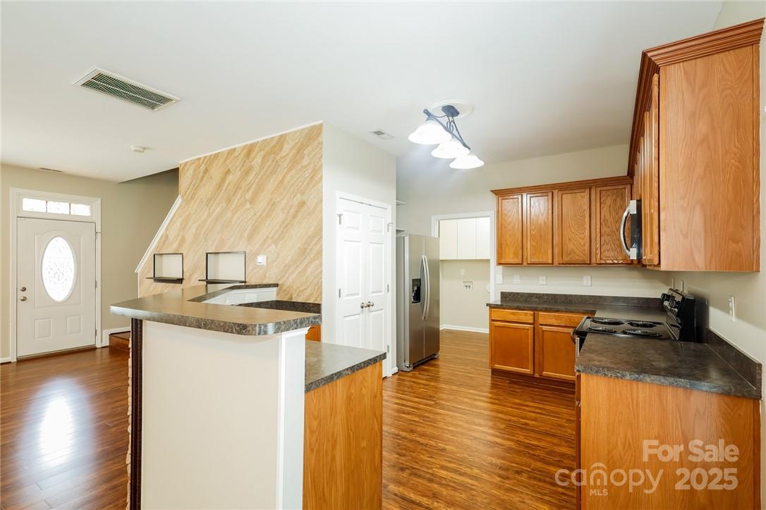 733 Jones Branch Road Fort Mill, SC 29715 - Photo 7 of 15 a kitchen with a stove a sink and a refrigerator