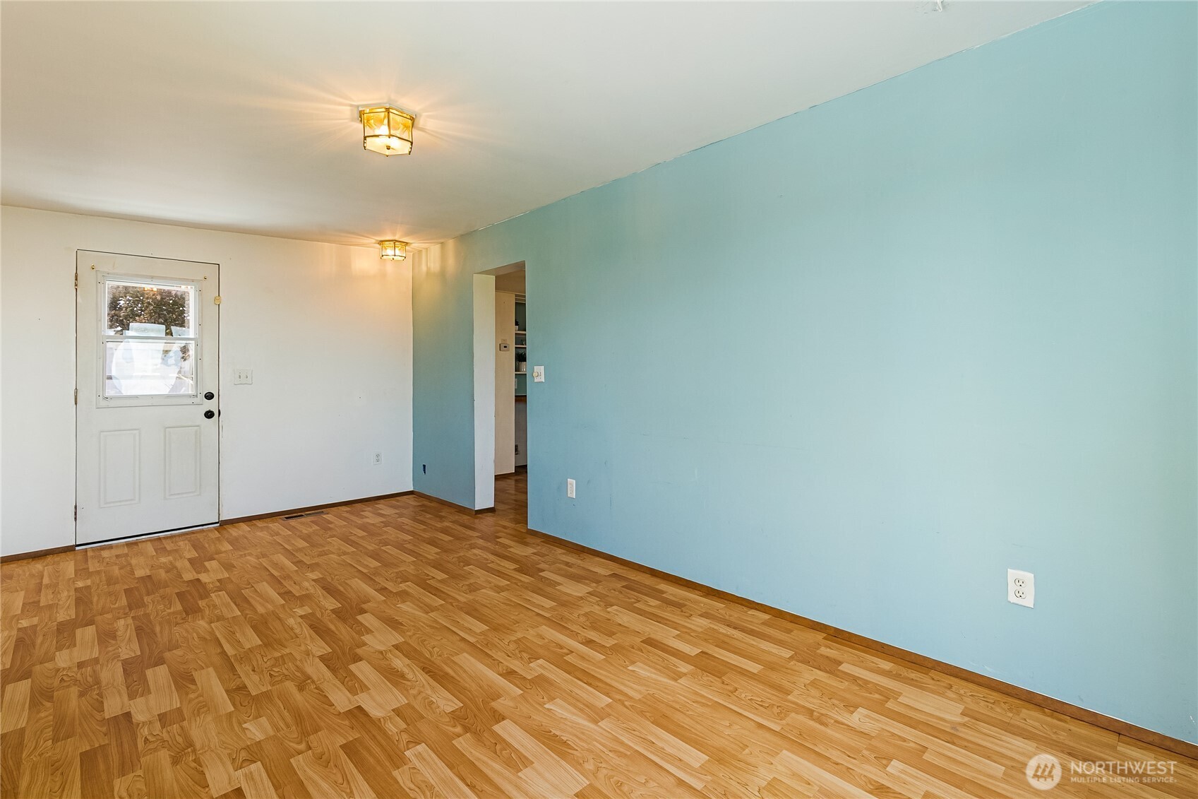 8080 Harborview Road, Unit 167 Blaine, WA 98230 - Photo 7 of 27 a view of empty room with wooden floor