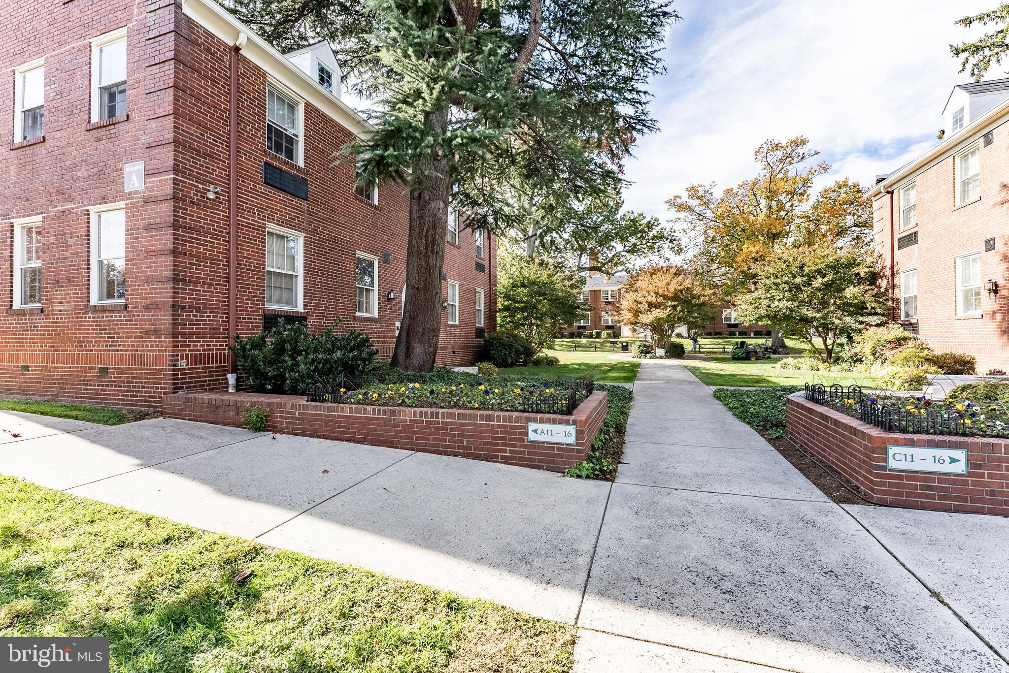 715 South Washington Street, Unit A16 Alexandria, VA 22314 - Photo 12 of 23 a view of a yard with potted plants