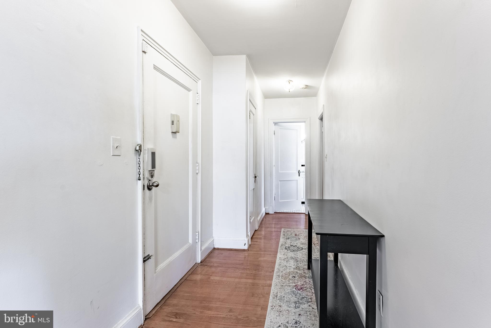 715 South Washington Street, Unit A16 Alexandria, VA 22314 - Photo 17 of 23 a view of a bathroom with mirror and shower
