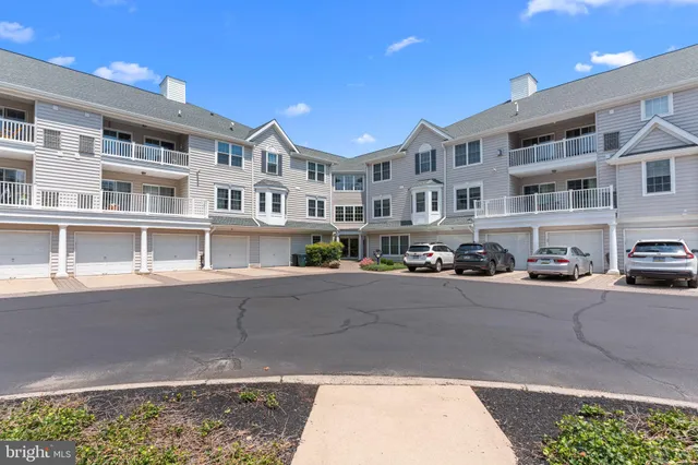 a front view of a building with street view