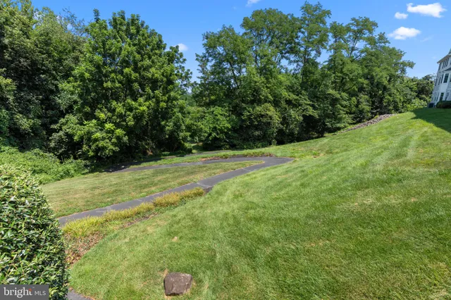 a view of a field with an outdoor space