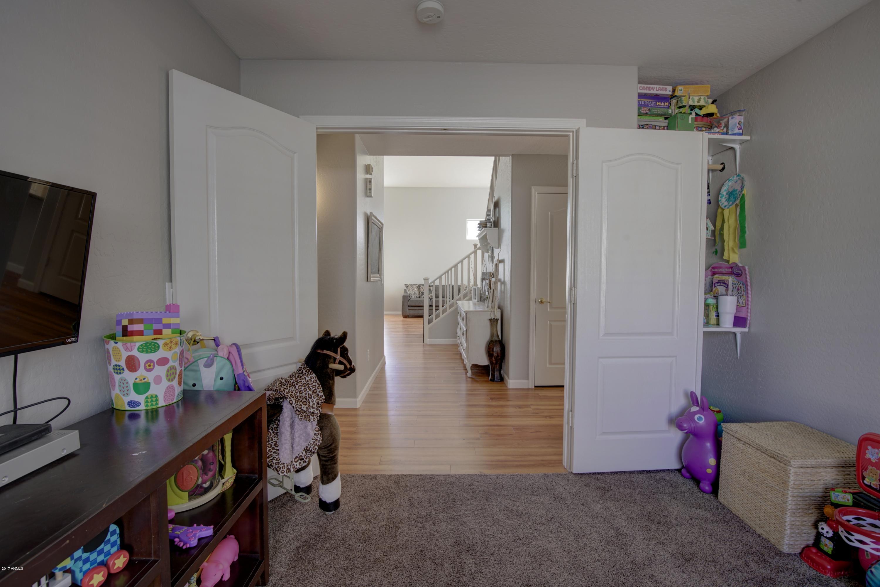 4253 East Ivanhoe Street Gilbert, AZ 85295 - Photo 18 of 35 Downstairs bedroom