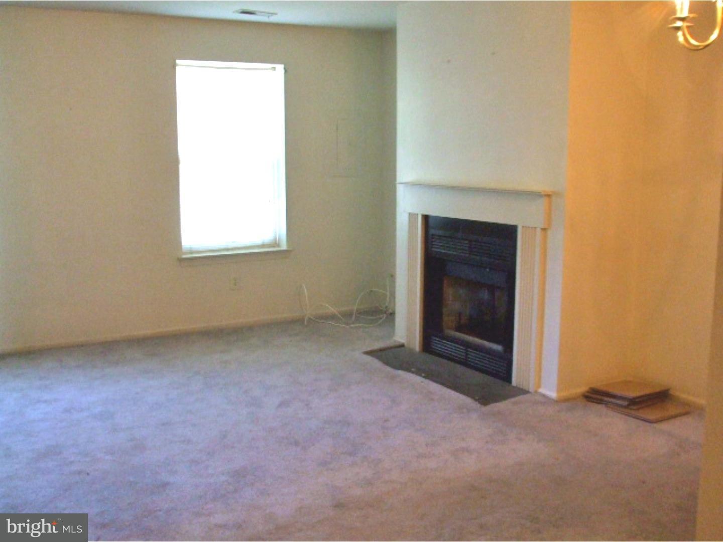 1109 Huntingdon Mews Clementon, NJ 08021 - Photo 2 of 9 Living Room with a fireplace.