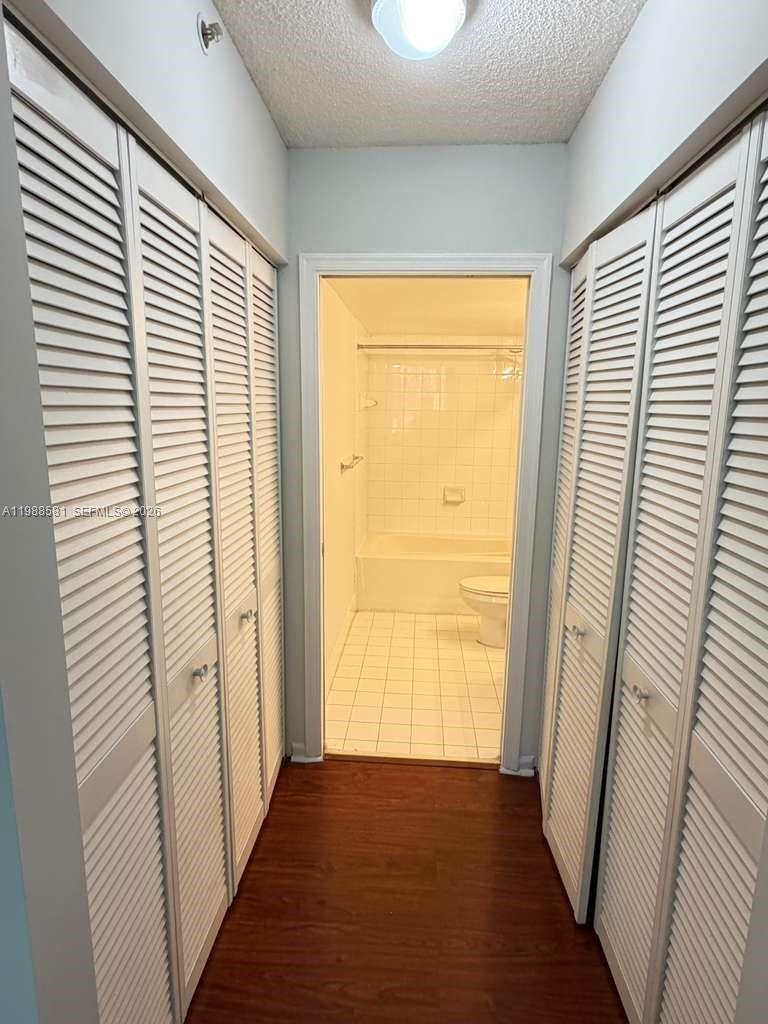 2173 Renaissance Boulevard, Unit 101 Miramar, FL 33025 - Photo 12 of 27 wooden floor in a room next to a window