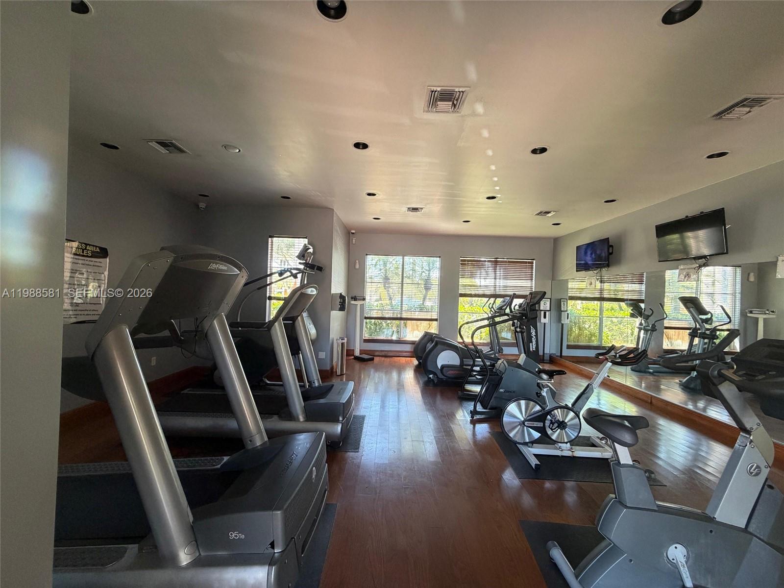 2173 Renaissance Boulevard, Unit 101 Miramar, FL 33025 - Photo 26 of 27 a view of a room with gym equipment