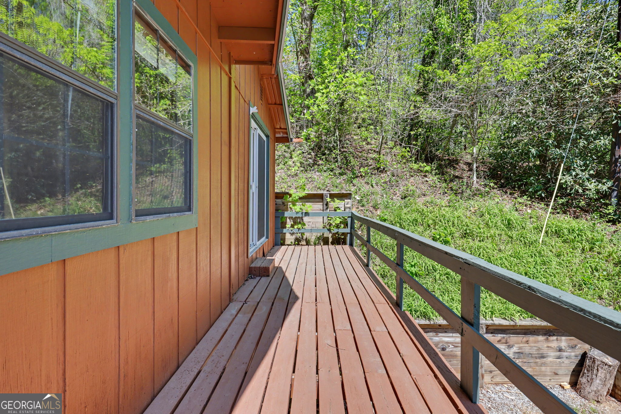 138 Taylors Chapel Road Rabun Gap, GA 30568 - Photo 29 of 52 a view of a balcony with wooden floor