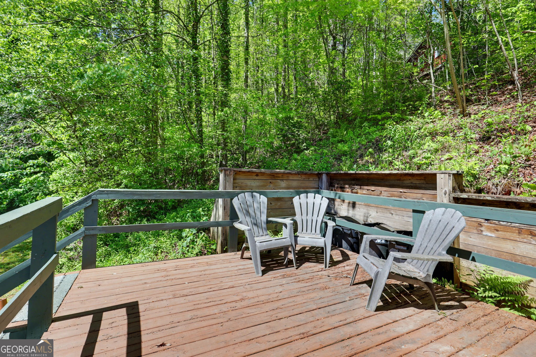 138 Taylors Chapel Road Rabun Gap, GA 30568 - Photo 33 of 52 a view of deck with chairs and wooden floor
