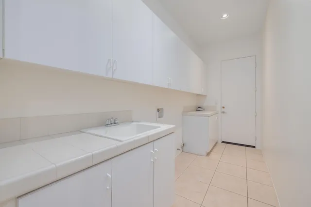 a view of yard with patio