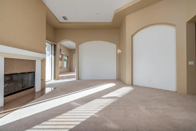 a view of a livingroom with a staircase