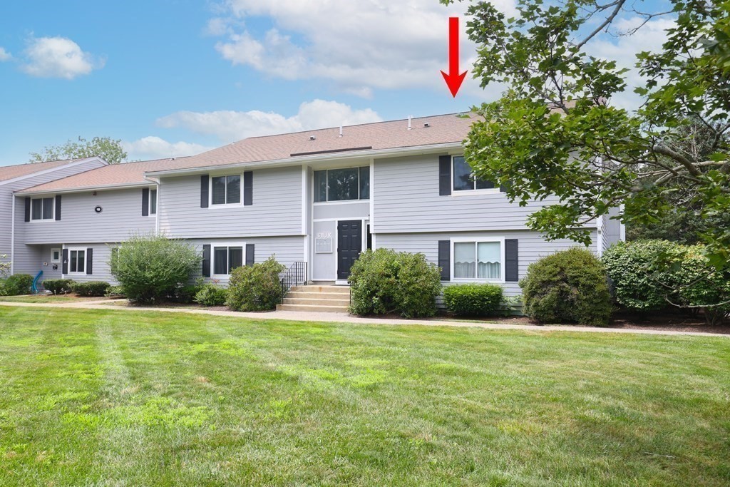 19 Beal's Cove Road, Unit K Hingham, MA 02043 - Photo 11 of 14 a front view of a house with garden