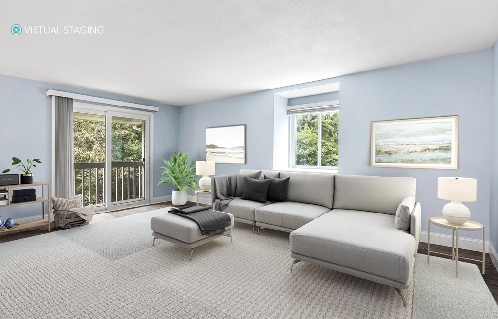 19 Beal's Cove Road, Unit K Hingham, MA 02043 - Photo 5 of 14 a living room with furniture and a window