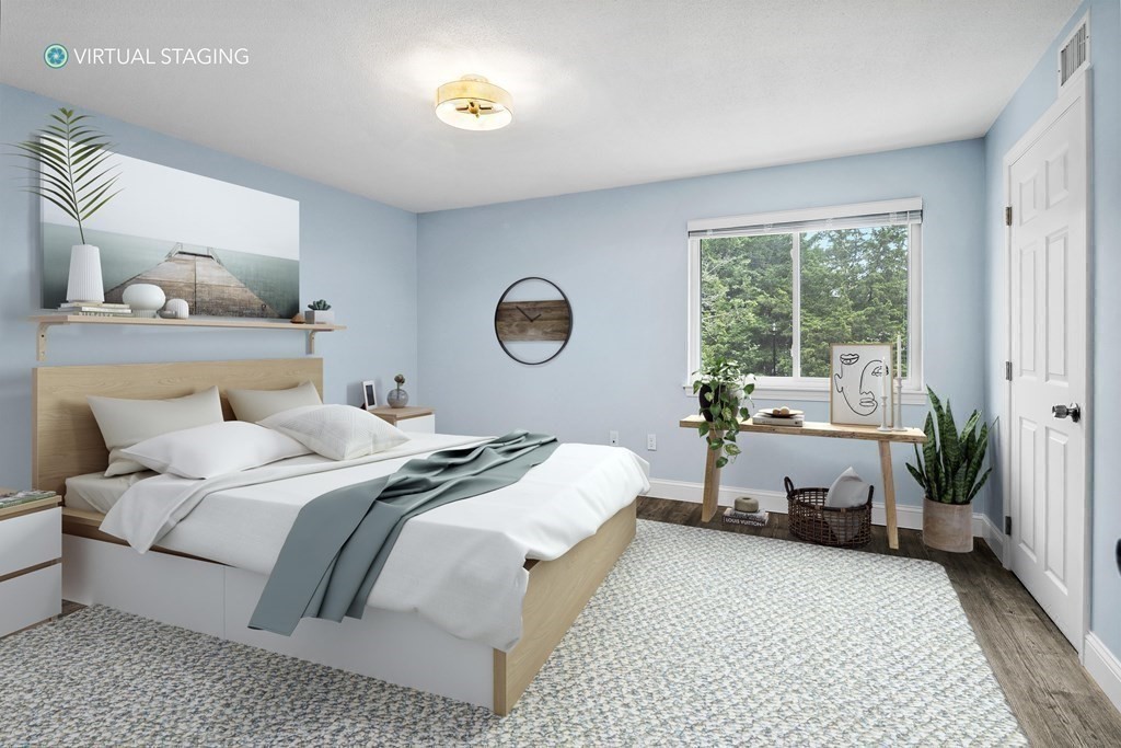 19 Beal's Cove Road, Unit K Hingham, MA 02043 - Photo 6 of 14 a bedroom with a bed and a window