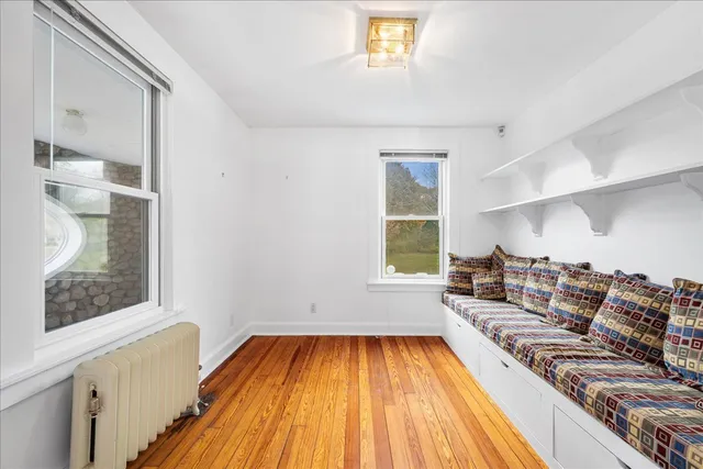 a view of swimming pool from a balcony