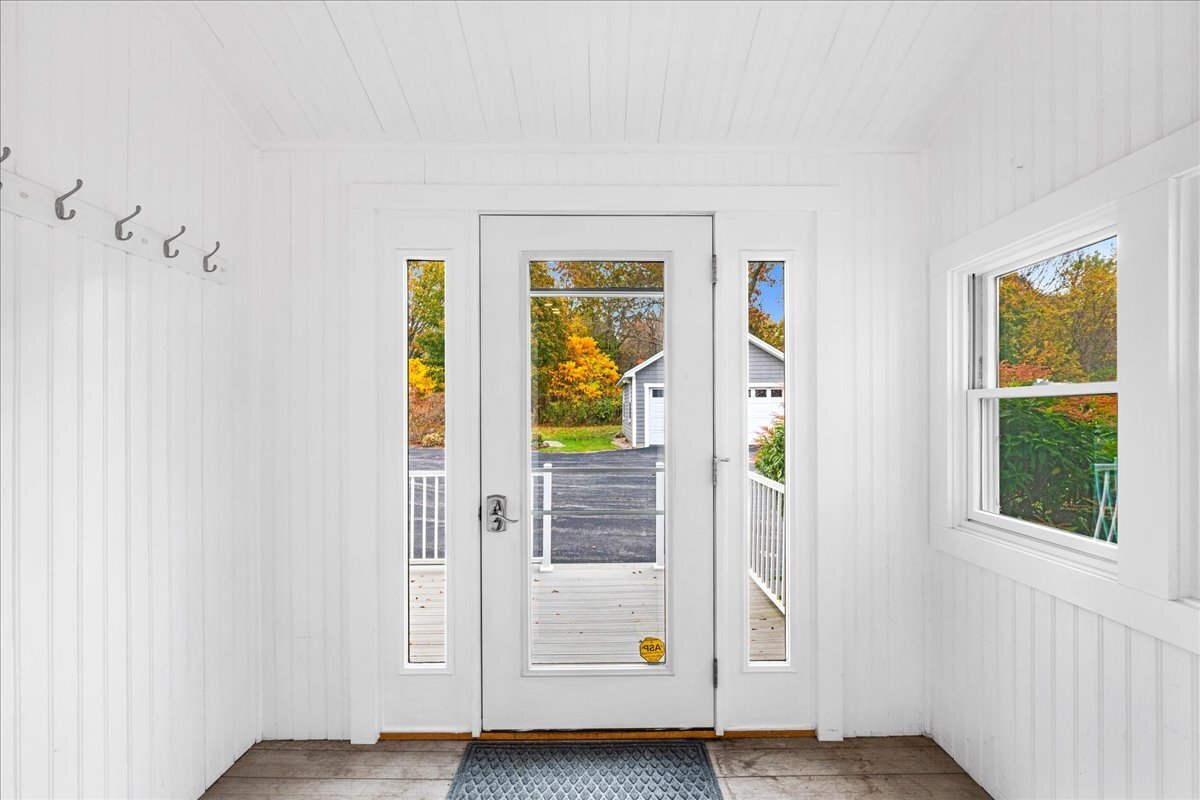 28 Palmer Neck Road Pawcatuck, CT 06379 - Photo 21 of 36 a view of an entryway with wooden floor