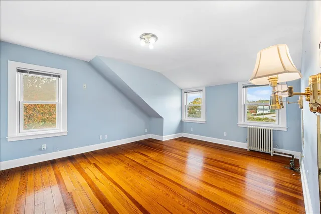 a bathroom with a sink a mirror and vanity