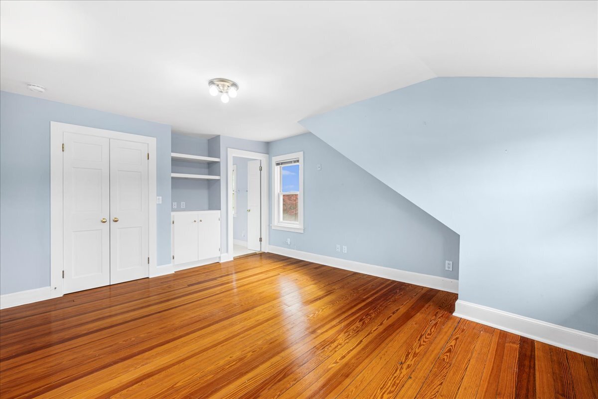 28 Palmer Neck Road Pawcatuck, CT 06379 - Photo 26 of 36 a view of empty room with wooden floor