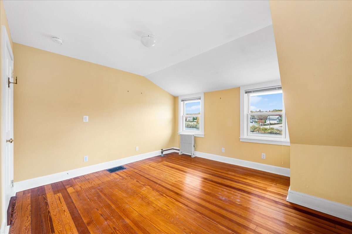 28 Palmer Neck Road Pawcatuck, CT 06379 - Photo 30 of 36 a view of a big room with wooden floor and windows