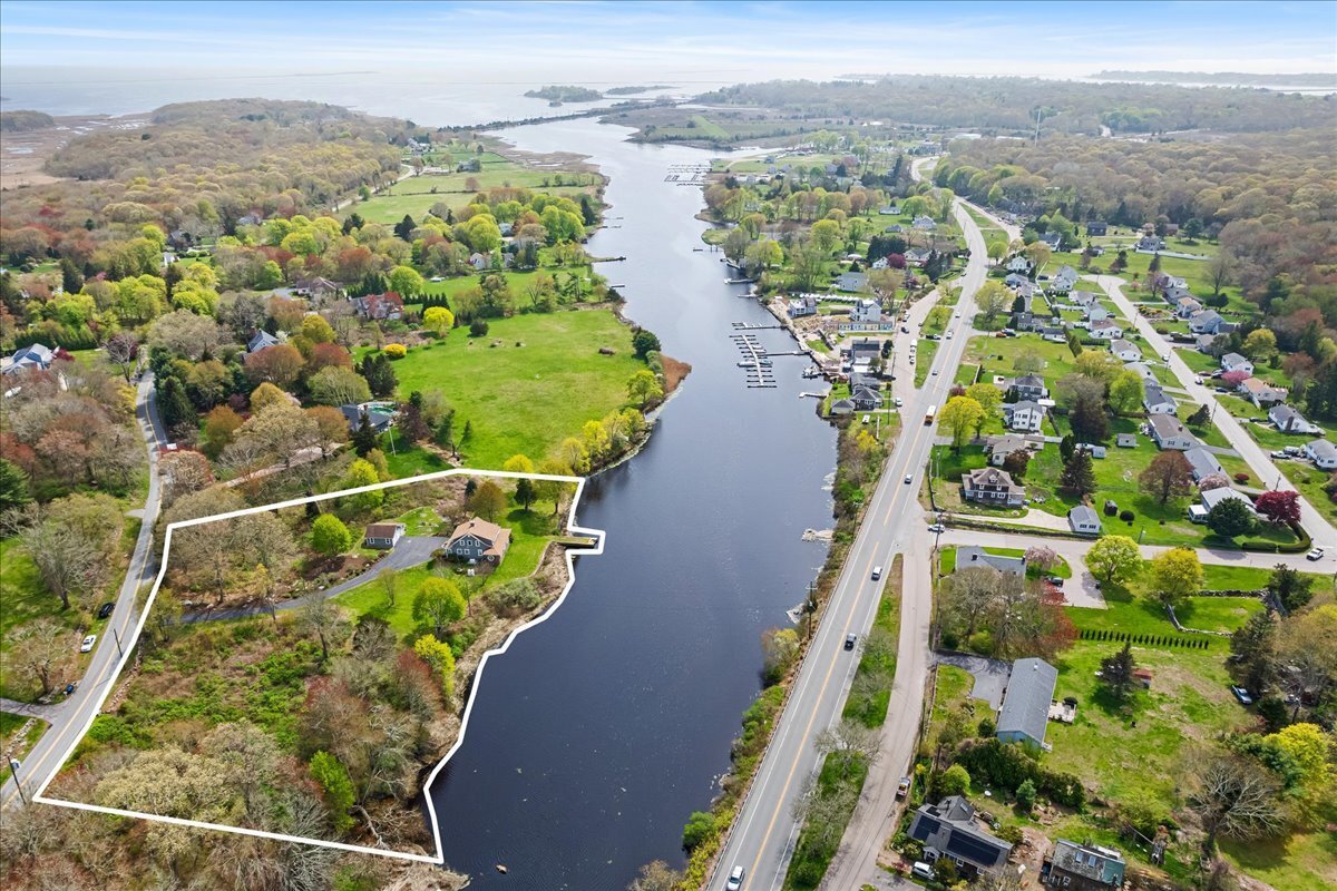 28 Palmer Neck Road Pawcatuck, CT 06379 - Photo 36 of 36 an aerial view of residential houses with outdoor space
