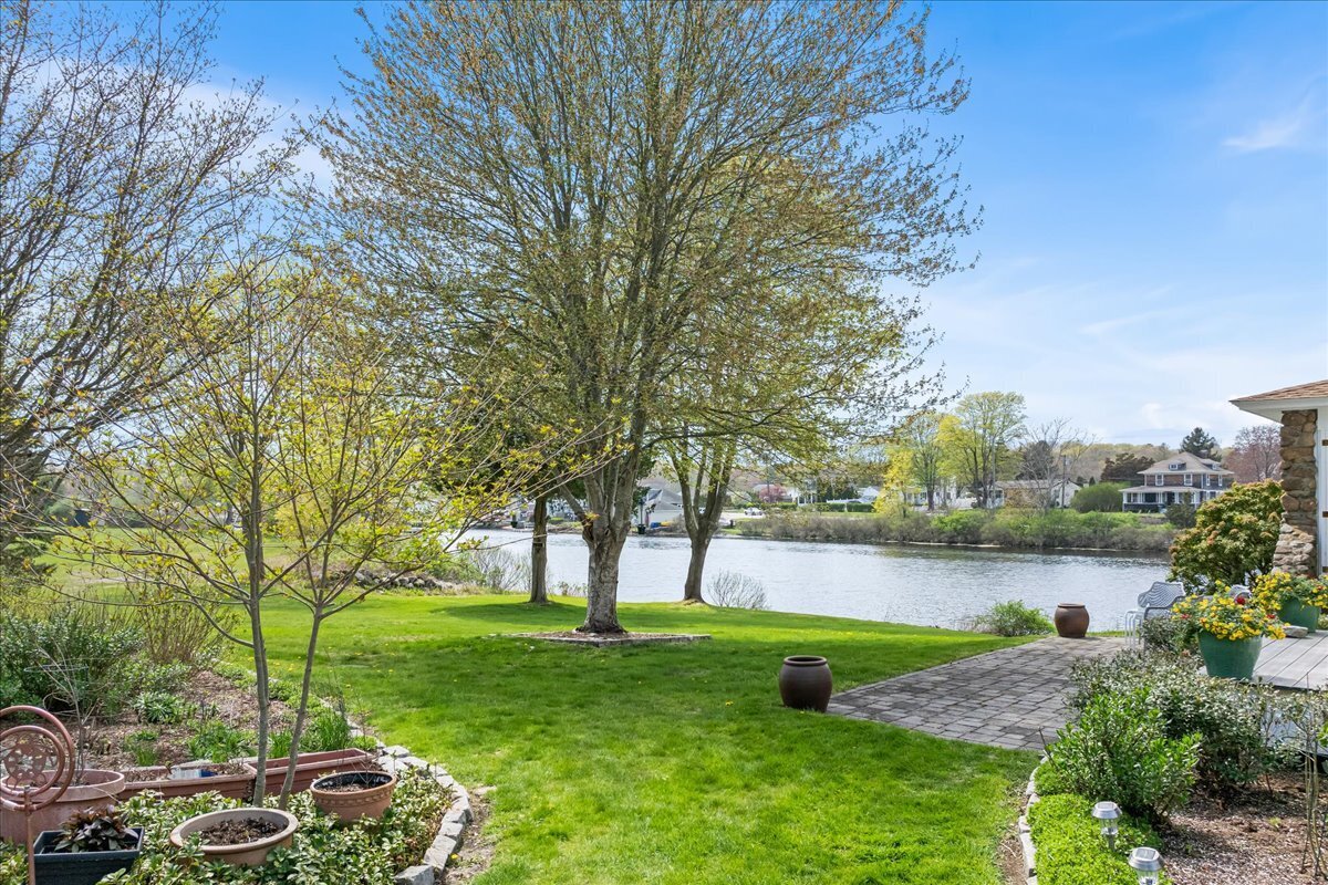 28 Palmer Neck Road Pawcatuck, CT 06379 - Photo 4 of 36 a view of outdoor space with deck and garden