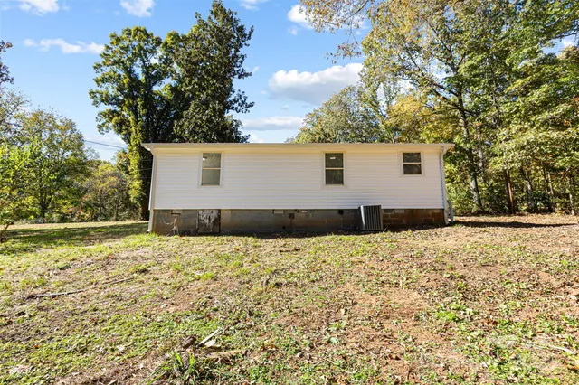 a house with trees in front of it