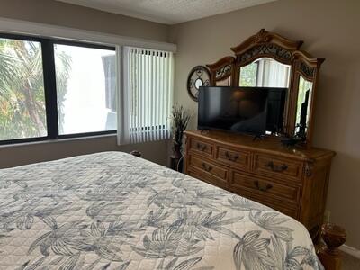 1605 Highway 1, Unit E301 Jupiter, FL 33477 - Photo 12 of 30 Master Bedroom