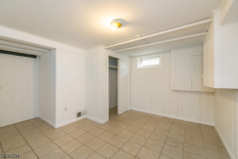 17 Cedar Street Bloomfield, NJ 07003 - Photo 15 of 21 a view of an empty room and window