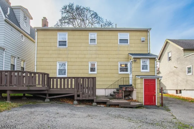 a view of backyard with deck