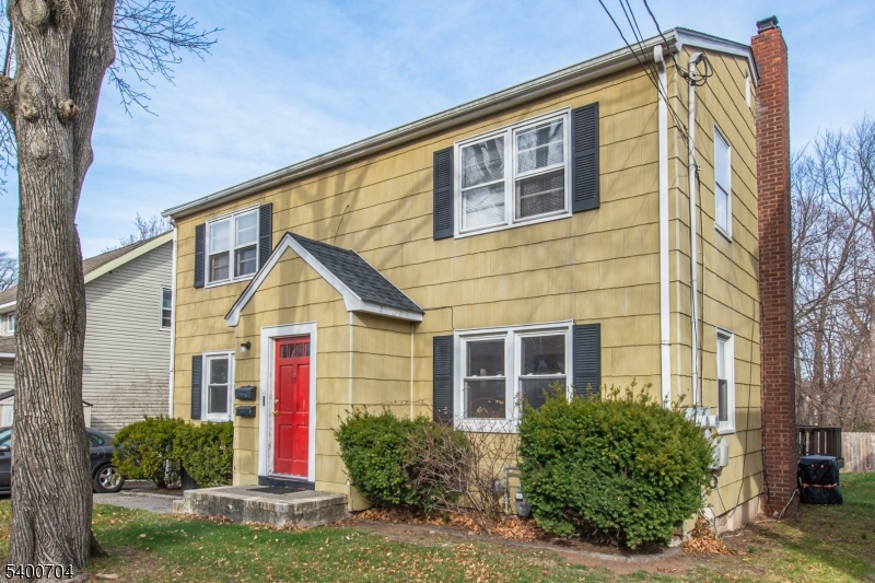 17 Cedar Street Bloomfield, NJ 07003 - Photo 21 of 21 a front view of a house with garden