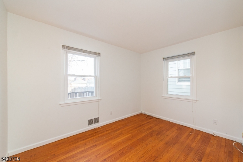 17 Cedar Street Bloomfield, NJ 07003 - Photo 3 of 21 an empty room with a window
