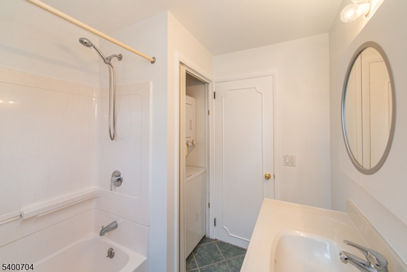 17 Cedar Street Bloomfield, NJ 07003 - Photo 5 of 21 a bathroom with a sink a toilet and shower