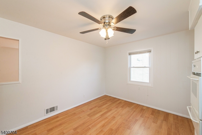 17 Cedar Street Bloomfield, NJ 07003 - Photo 9 of 21 a view of an empty room with a window