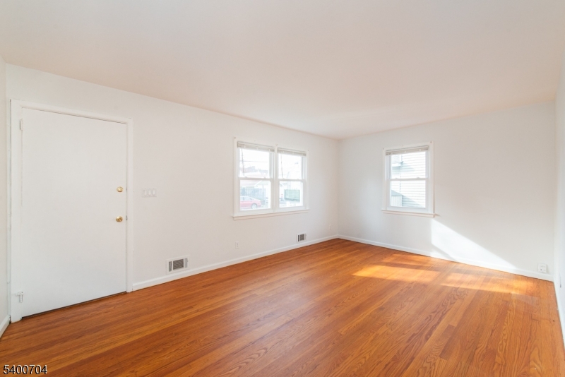 17 Cedar Street Bloomfield, NJ 07003 - Photo 10 of 21 an empty room with windows