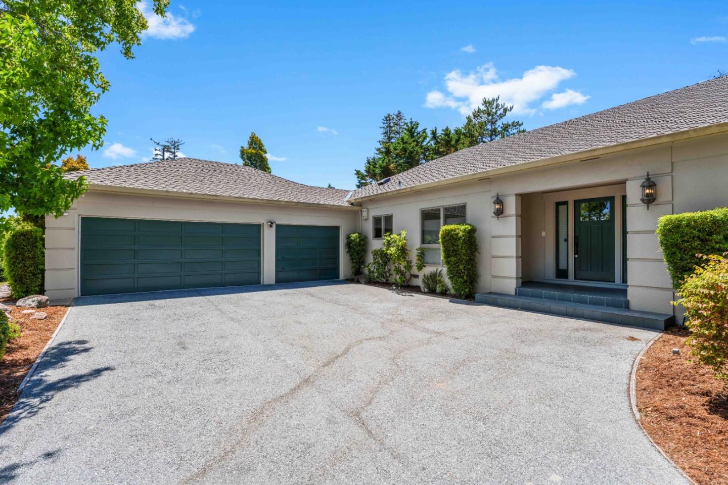 705 Jacaranda Circle Hillsborough, CA 94010 - Photo 1 of 1 a front view of a house with garden