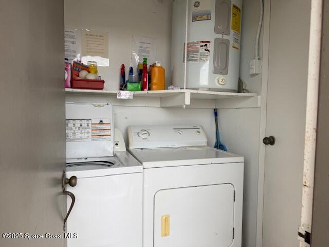 2727 North Wickham Road, Unit 20510 Melbourne, FL 32935 - Photo 21 of 25 a utility room with dryer and washer