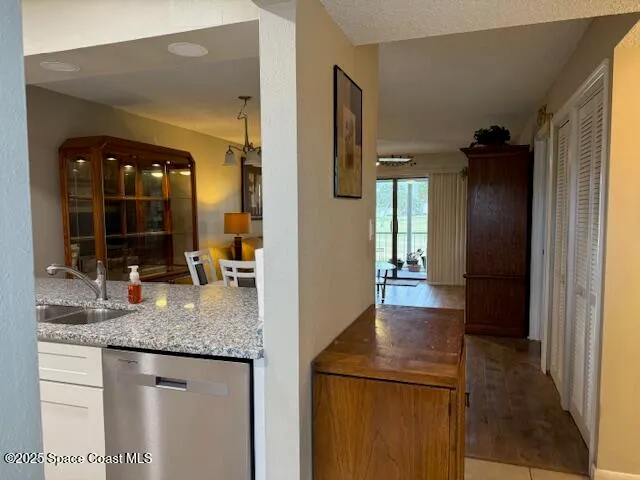 a kitchen with refrigerator and counter space