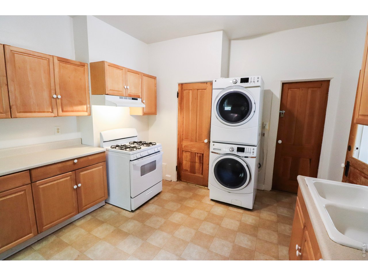 608 South Howes Street Fort Collins, CO 80521 - Photo 8 of 28 a view of a kitchen with washer and dryer