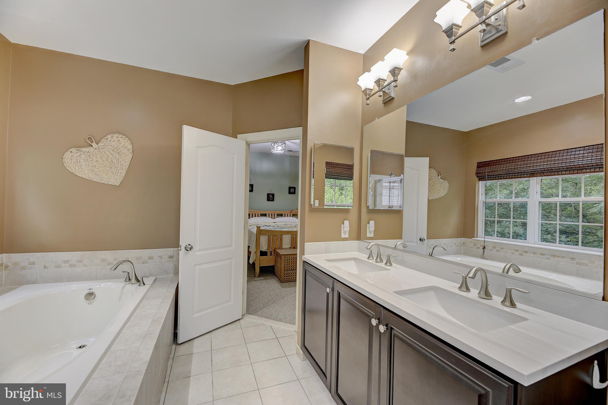 9933 Veiled Dawn Laurel, MD 20723 - Photo 32 of 46 Primary Bathroom