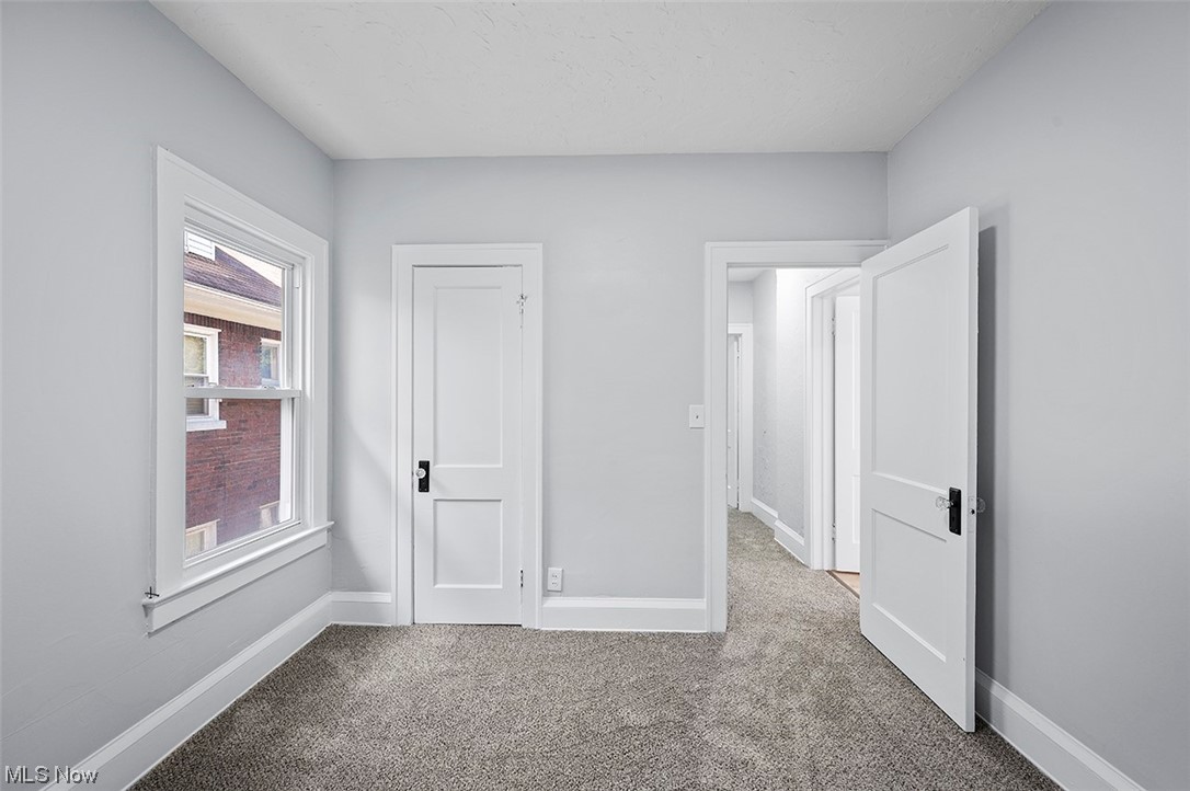 2174 Oakdale Road Cleveland, OH 44118 - Photo 31 of 35 Empty room with light colored carpet