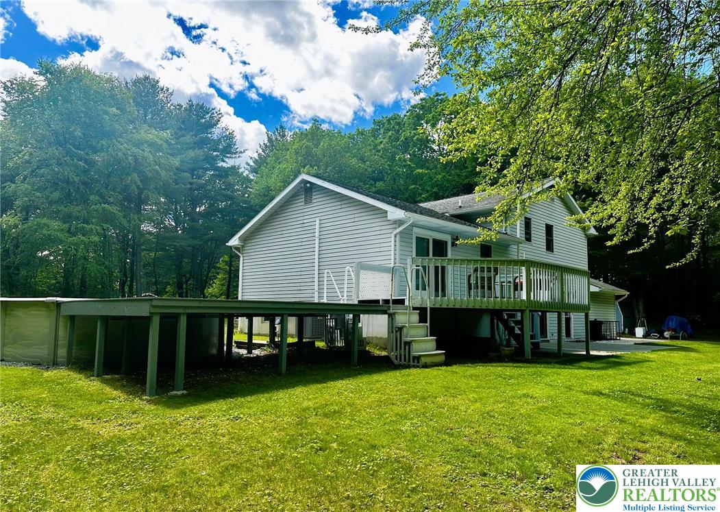 93 Sassafras Road Lehighton, PA 18235 - Photo 48 of 67 Composite pool deck connects to the rear deck