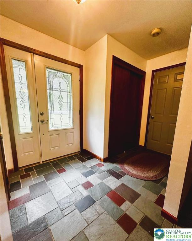 93 Sassafras Road Lehighton, PA 18235 - Photo 10 of 67 Front Entry Foyer with access to the built-in 2 ca