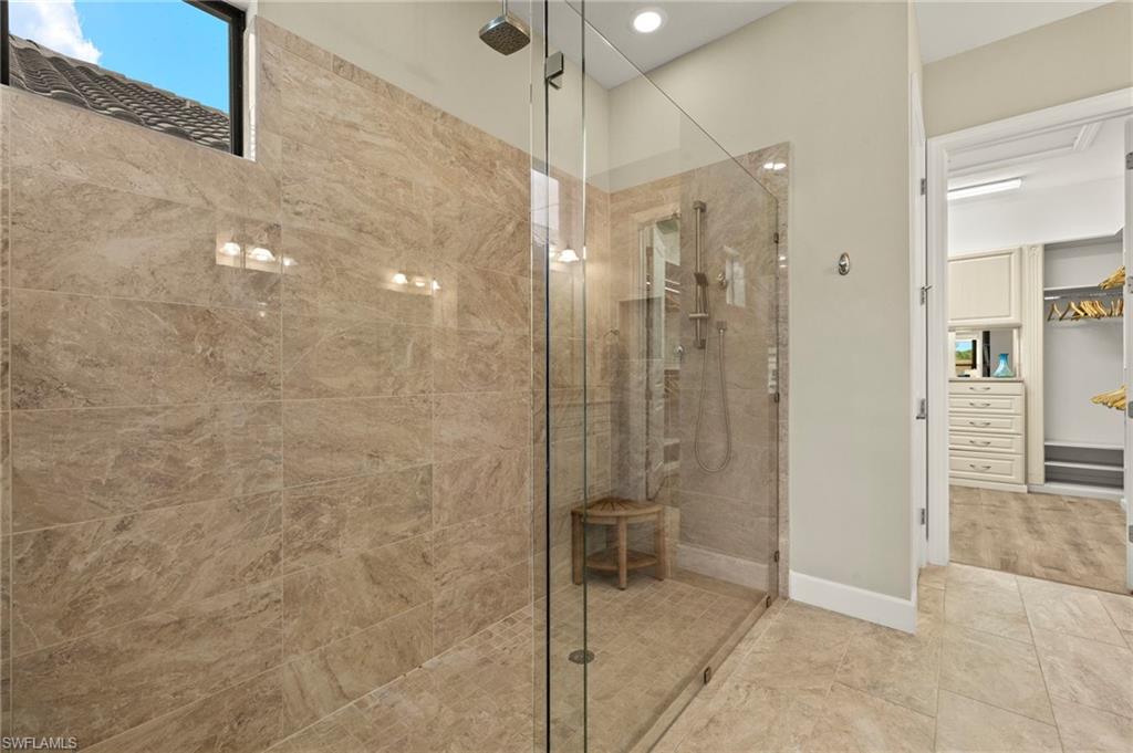 10234 Coconut Road Estero, FL 34135 - Photo 20 of 36 a bathroom with a shower